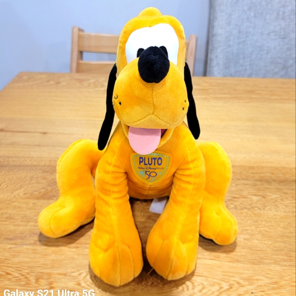 Walt Disney World 50th anniversary series Pluto plush.. Like new